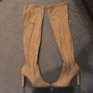 Tall heeled boots